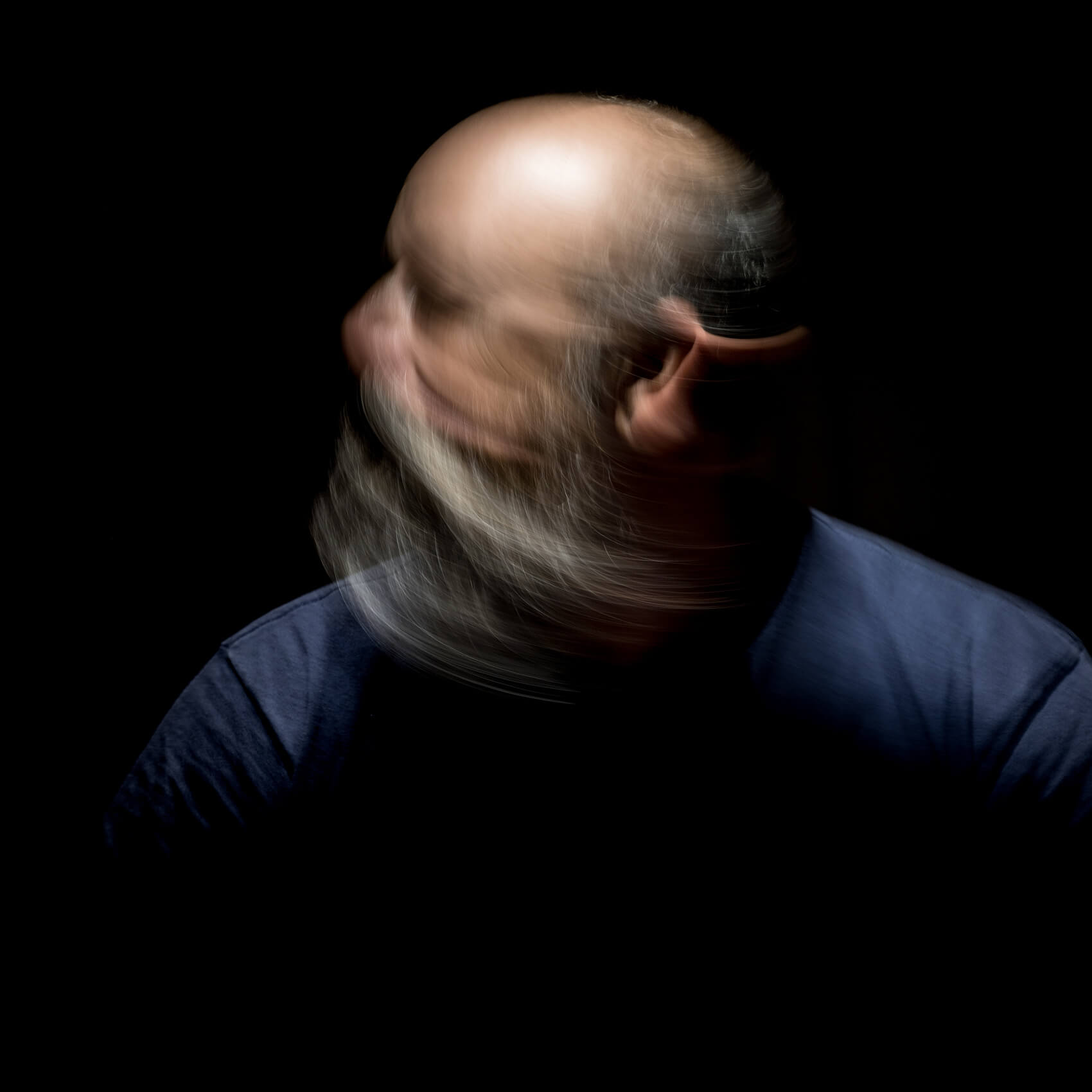 bearded-man-motion-blur-portrait-2026-03-17-06-30-28-utc