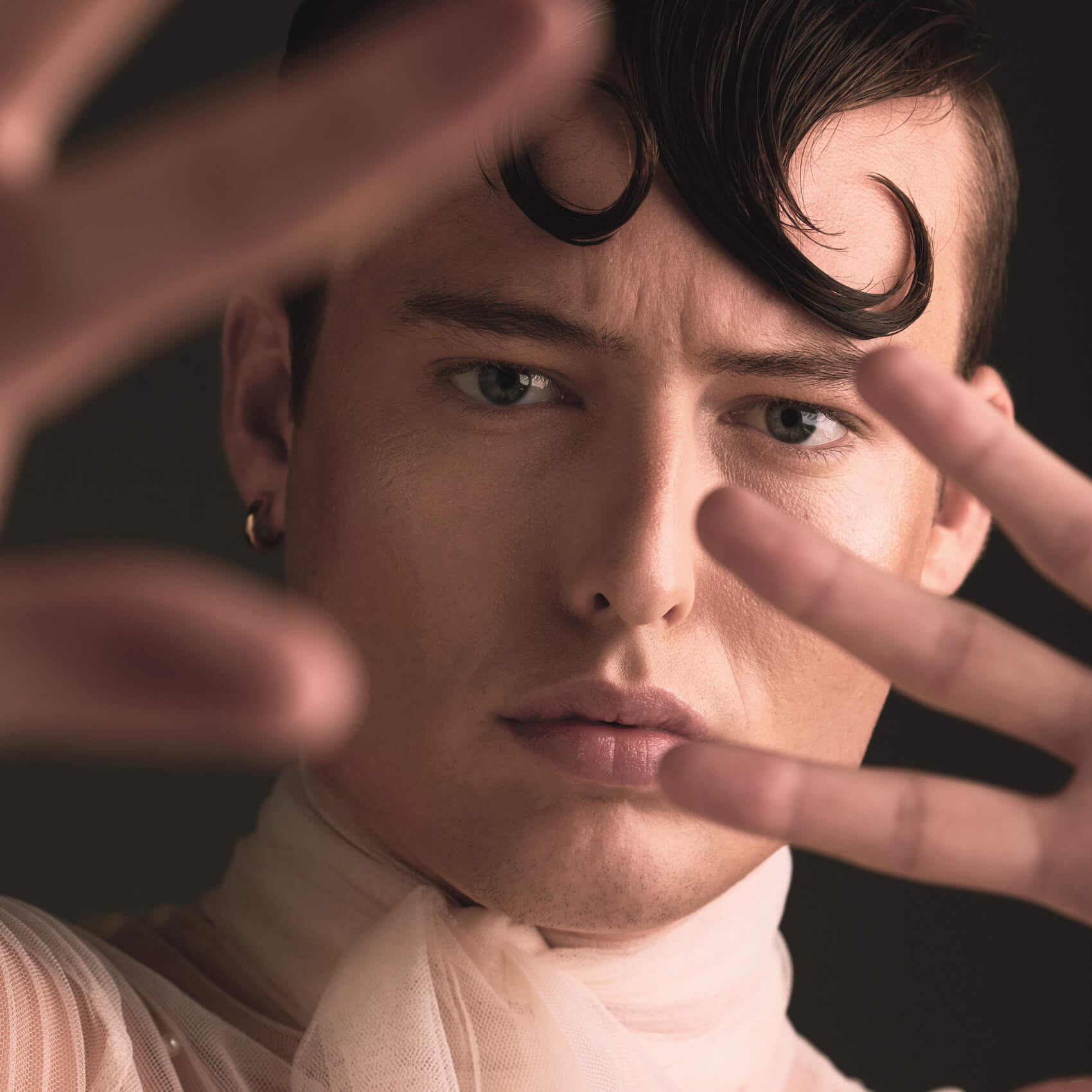 beauty-portrait-of-transgender-man-isolated-on-dar-2026-03-25-06-04-28-utc